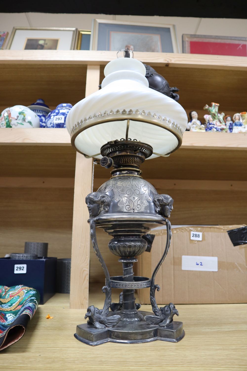 A Victorian Hinks silver plated oil lamp, shade and chimney